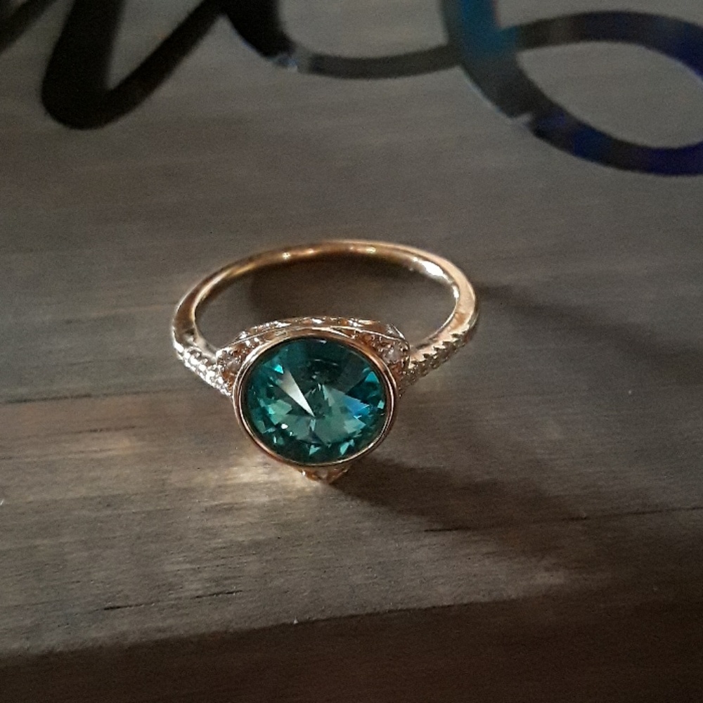 Aqua marine and gold ring